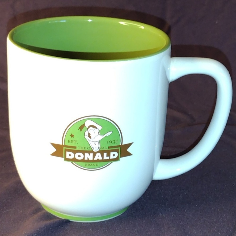 Disney Parks Donald Duck The Original Donald Brand Coffee Mug Green White Cup